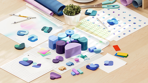 Image of shapes and emojis spread around on a desk. purple and pink colors